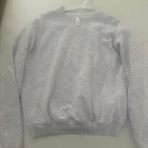 Skims cotton fleece classic crewneck in light heather grey.